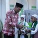 Hadiri Wisuda Tahfidz dan Peresmian Gedung Baru MI Terpadu Al-Falah, Bupati Safaruddin: Kami Bangga dengan MIT Al-Falah