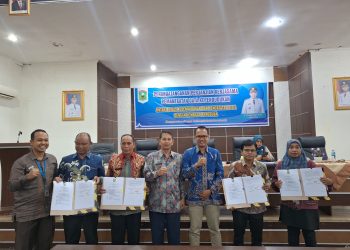 Disdukcapil Kab.Solok Melakukan Perjanjian Kerjasama dengan 19 Lembaga Pemerintah dan Bidan Praktek Mandiri di Kab.Solok