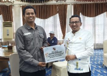 Pemuda Pancasila Kabupaten Indragiri Hulu Menyerahkan Bantuan Untuk Korban Banjir Bandang di Tanah Datar