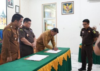 Bupati Jon Firman Pandu Hadiri Acara Penandatanganan Nota Kesepahaman bersama Kajari Solok
