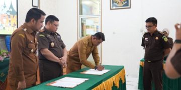 Bupati Jon Firman Pandu Hadiri  Acara Penandatanganan Nota Kesepahaman bersama Kajari Solok